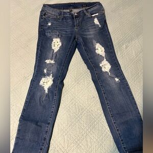 Distressed Blue Jeans